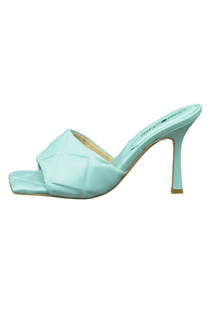 A stylish pair of blue leather square toe heel mules with a chunky heel for women.