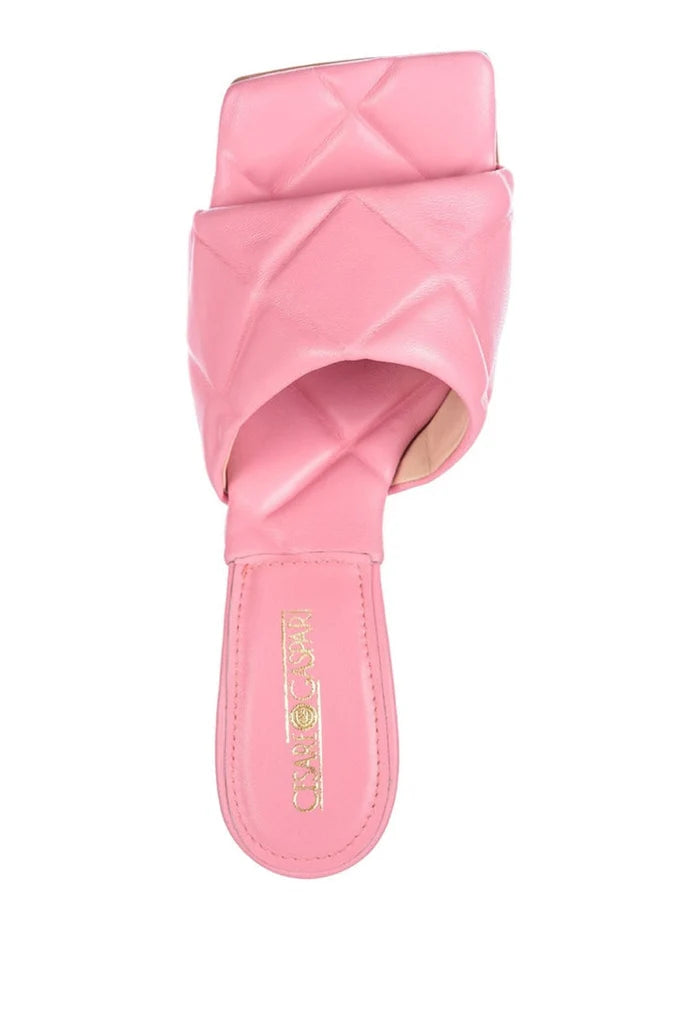 A stylish and fashionable square toe mule in pink, perfect for a trendy and chic look in women's fashion footwear.