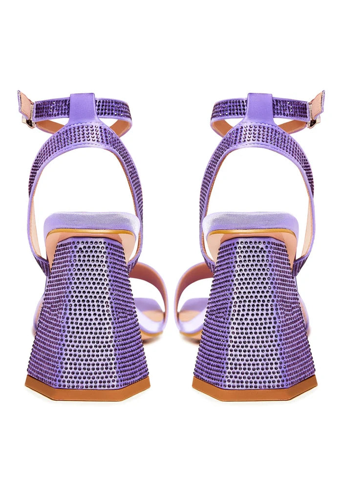 A close-up image of lilac strappy block heel sandals with rhinestone embellishments, perfect as women's evening sandals or rhinestone block heel pumps.