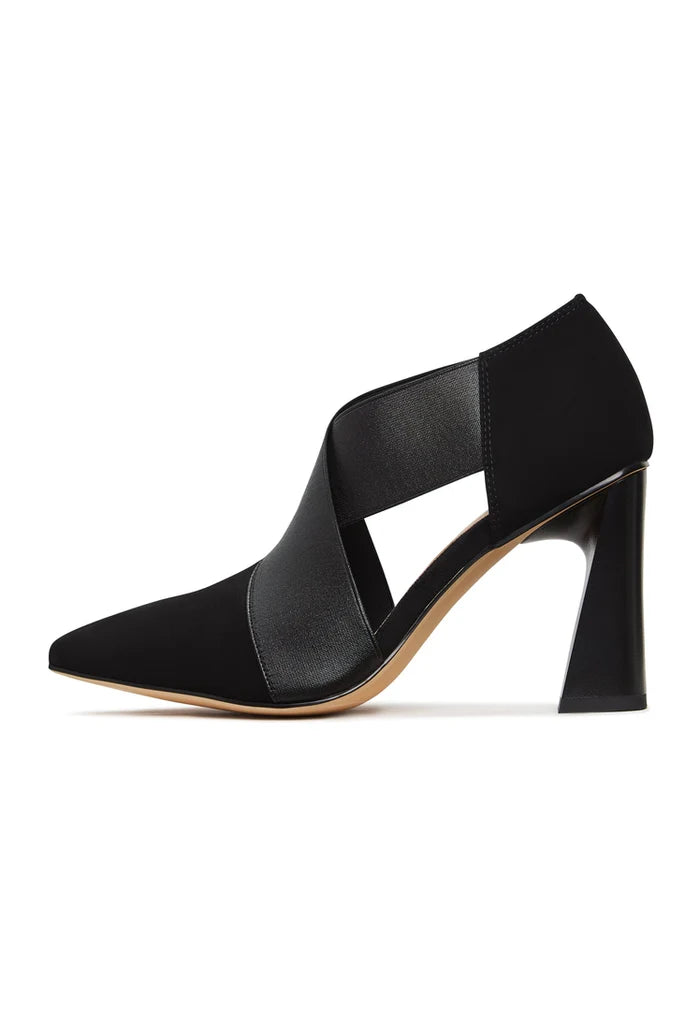 A trendy pair of black block heel sandals with strappy details, perfect for adding a touch of sass to any outfit.