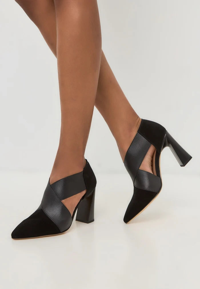 A stylish pair of black strappy high heels with block heels, perfect for any glamorous occasion.