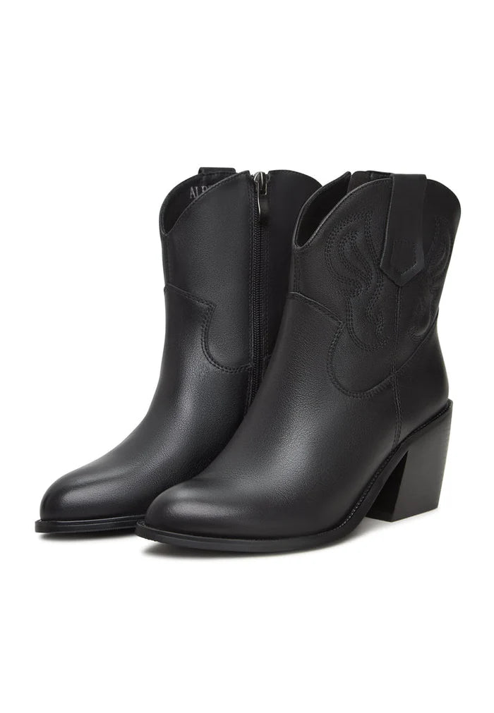 A stylish pair of brown suede ankle boots and black ankle boots, perfect for a trendy and fashionable look.