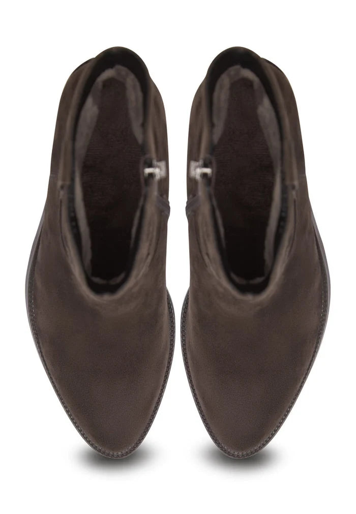 A stylish pair of brown suede ankle boots, perfect for a fashionable and trendy look.