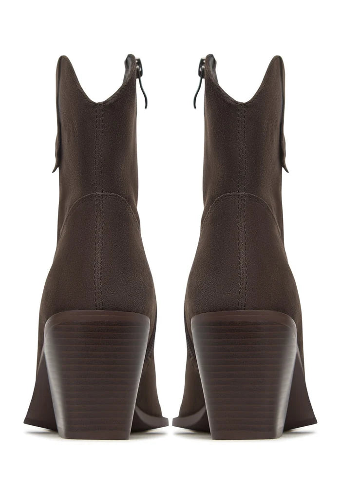 A pair of stylish brown suede ankle boots, perfect for a fashionable look.