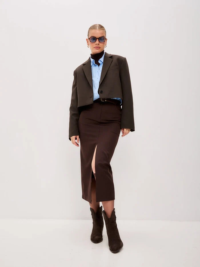 A pair of stylish brown suede ankle boots, the perfect fashionable addition to any outfit.