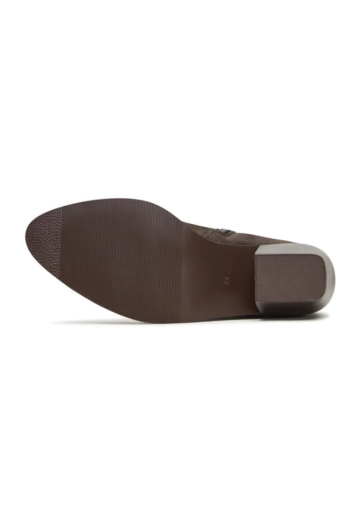 A stylish pair of brown suede ankle boots, perfect for a fashionable look.