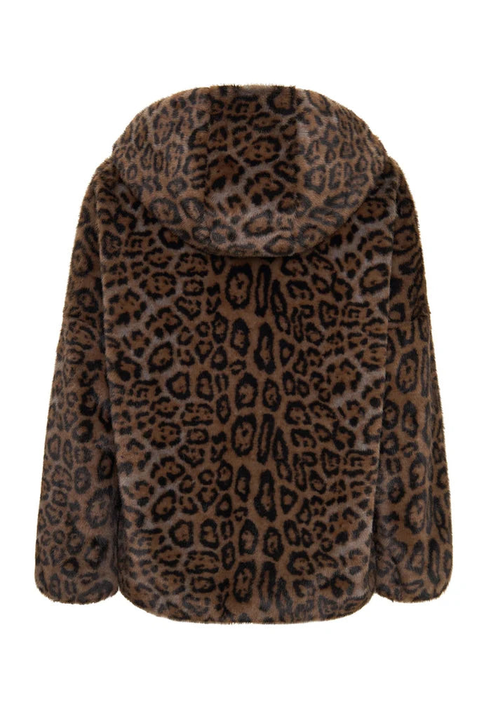 A fashionable woman wearing a stylish hooded faux fur jacket, the Reyna leopard jacket, making a trendy statement with this faux fur outerwear.