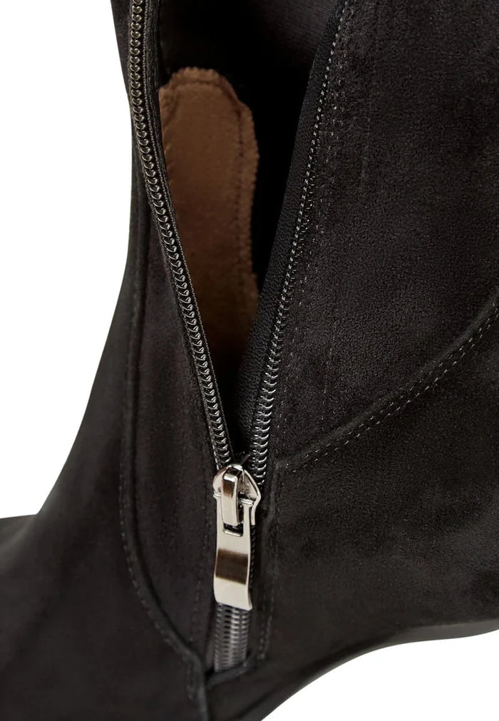 A stylish pair of over-the-knee suede boots - the ultimate chic fashion statement in women's footwear.