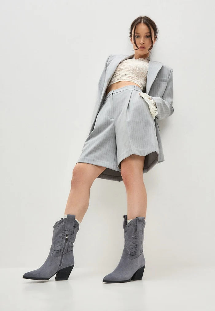 A pair of stylish women's suede cowboy boots in a beautiful grey color, featuring the Elena design - perfect for any western fashion lover.