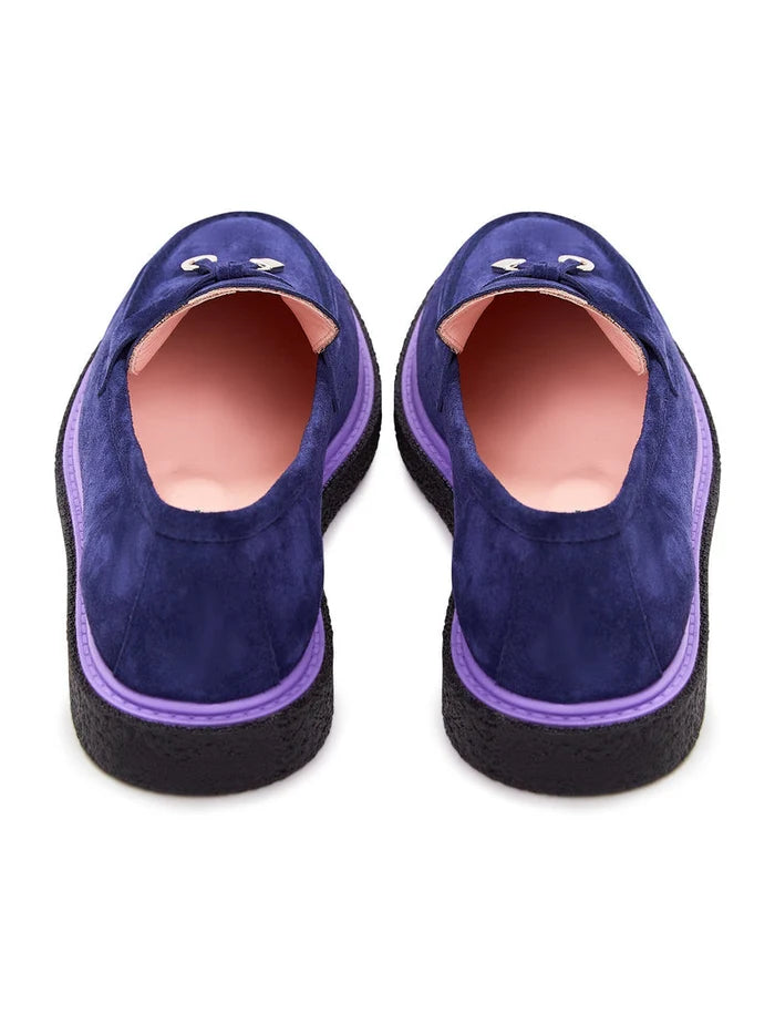 A sleek pair of navy blue slip-on suede loafers for men, perfect for those seeking a stylish and sophisticated footwear option.