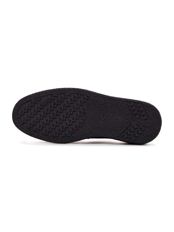 A stylish pair of navy blue slip-on suede loafers for men, perfect for any occasion.