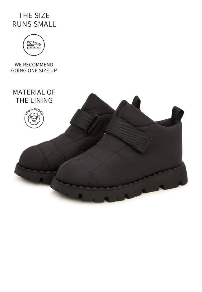 Stay warm and stylish this winter with black suede wool-lined winter boots that are perfect for any snowy day.