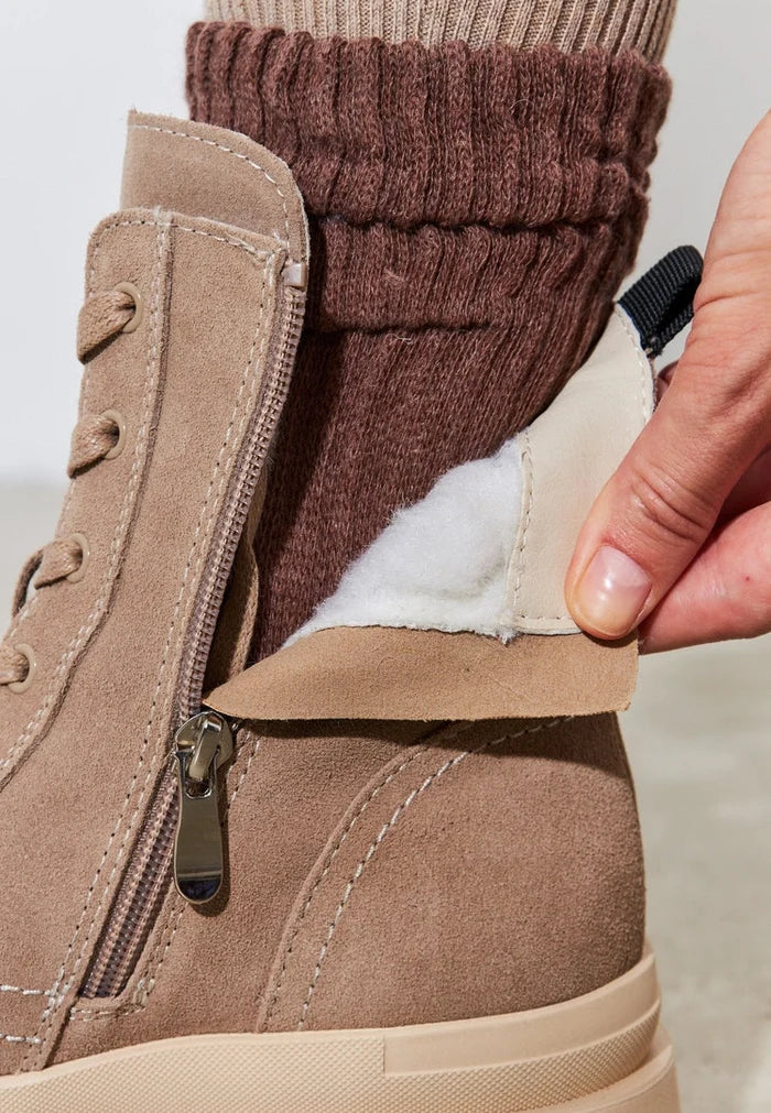A pair of stylish lace-up ankle boots, perfect for trendy urban street style fashion.