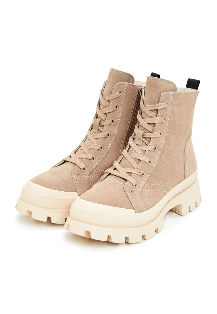 A pair of chic lace-up ankle boots, perfect for trendy urban street style fashion.