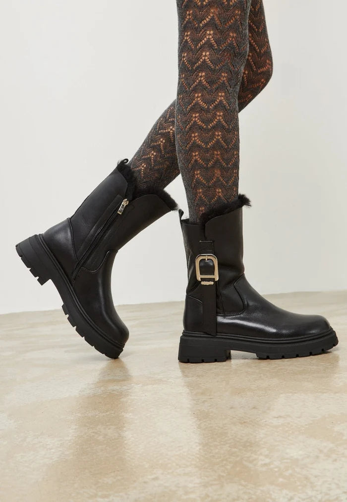 A pair of trendy leather platform ankle boots, perfect for urban style fashionistas.