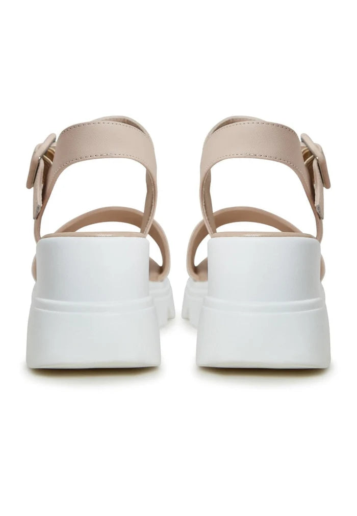 A pair of stylish leather platform sandals, perfect for urban footwear fashion.