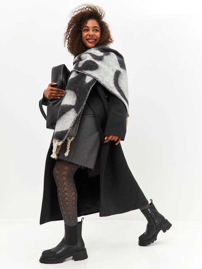 A stylish pair of black urban ankle boots with a platform design, perfect for women's fashion footwear.