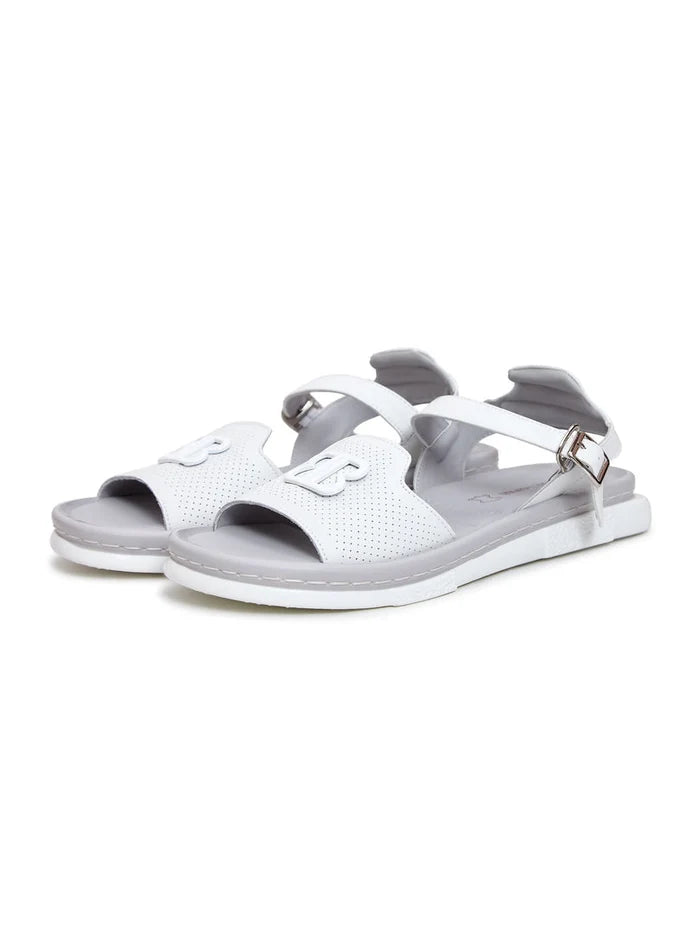 A trendy pair of white platform sandals for women, perfect for any urban fashionista looking for fashionable and comfortable footwear.