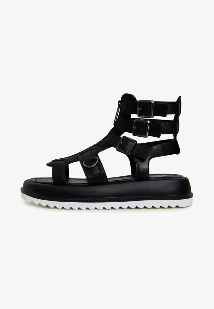 A pair of stylish urban platform sandals with a unique design and trendy appeal.