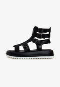 A pair of stylish urban platform sandals with a unique design and trendy appeal.