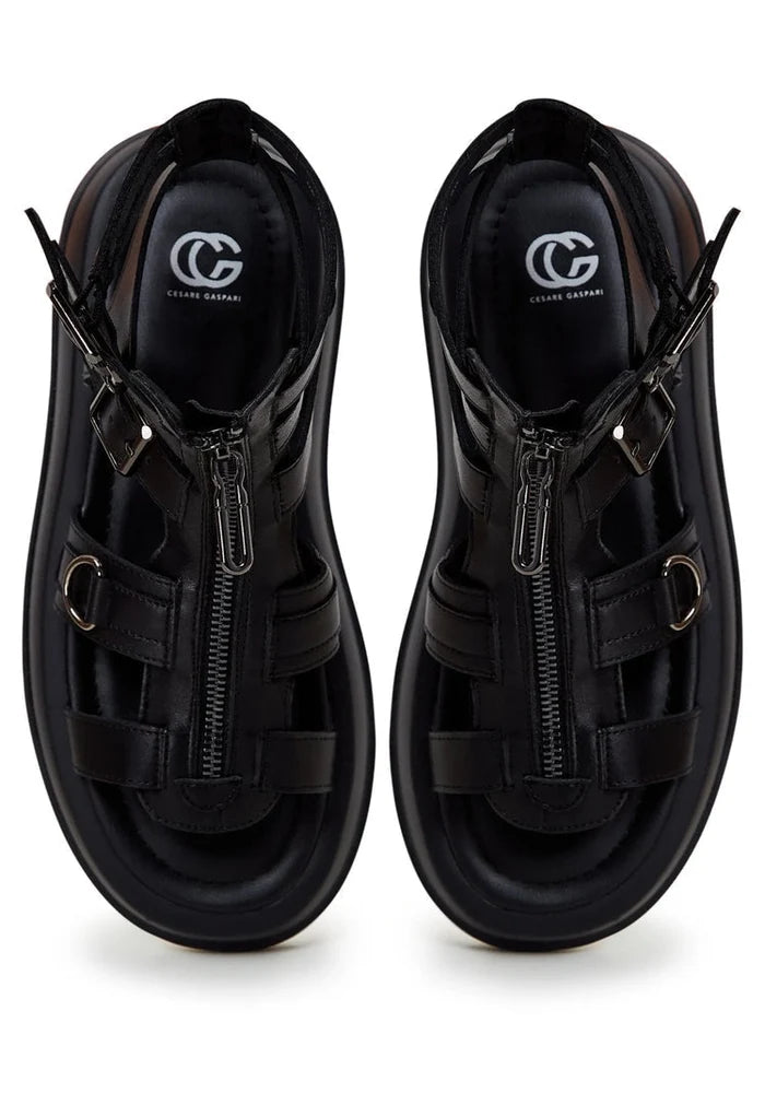 A pair of stylish urban platform sandals featuring a trendy strappy design and chunky sole, perfect for your modern city adventures.