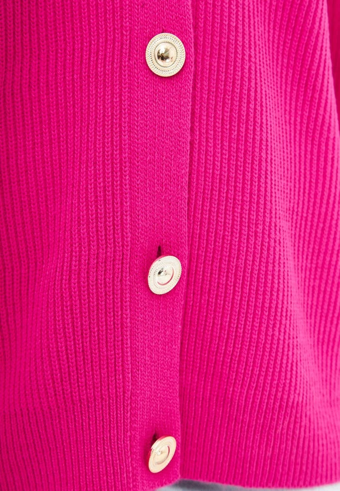A stylish pink V-neck cardigan, perfect for women looking for a cozy and fashionable addition to their wardrobe.