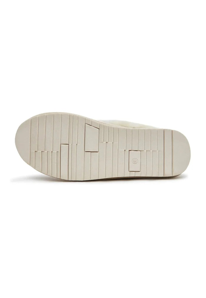 Stay cozy and stylish with these off white loafers, featuring warm padding for ultimate comfort. Perfect slip-on shoes for a relaxed day out.