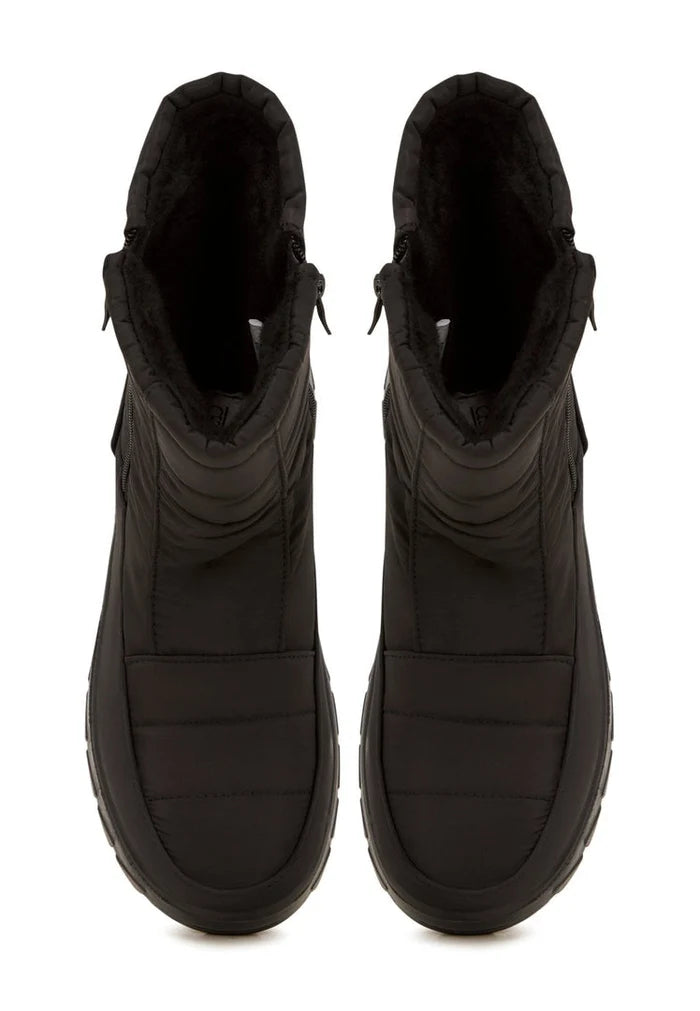 Stay warm and stylish this winter with these cozy suede boots, perfect for cold weather fashion.