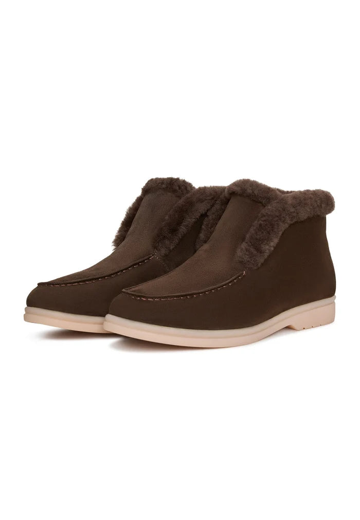 A pair of stylish brown Antonia ankle boots for women - perfect for winter weather.