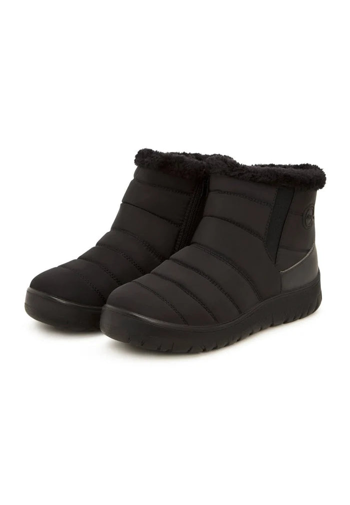 A trendy pair of women's chunky platform boots perfect for cold weather, great for winter fashion.
