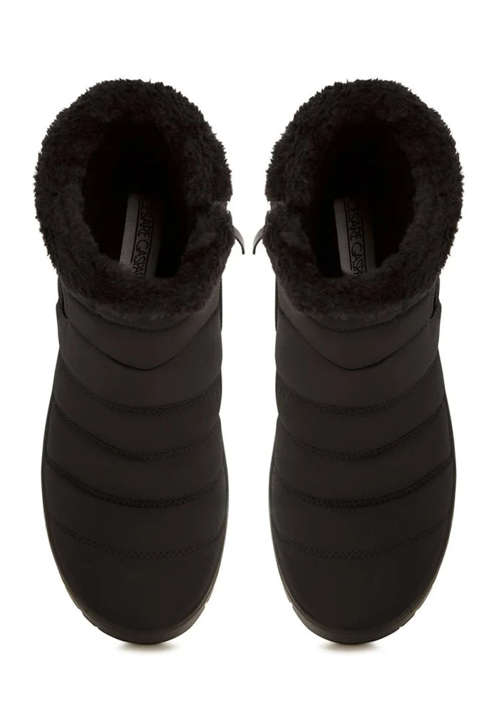 A stylish pair of women's chunky platform boots, perfect for cold weather. These trendy winter boots are a must-have for any fashion-forward individual.